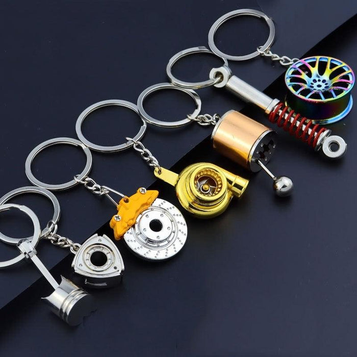 Creative Gift Car Metal Keychain Turbo Gear Hub Pendant Brake Disc Shock Absorber Pendant Alloy Short Quick Shifter Key Chain Ring Charming Auto Rainbow Metal Pendant Keyring Wheel Rim Tire Rotary Engine Keyring