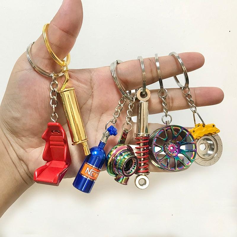 Creative Gift Car Metal Keychain Turbo Gear Hub Pendant Brake Disc Shock Absorber Pendant Alloy Short Quick Shifter Key Chain Ring Charming Auto Rainbow Metal Pendant Keyring Wheel Rim Tire Rotary Engine Keyring